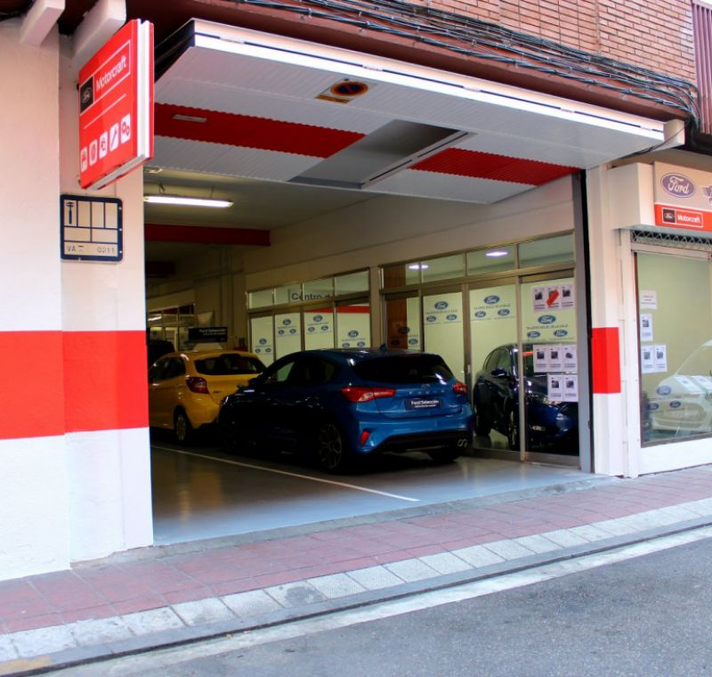 Entrada a taller de coches